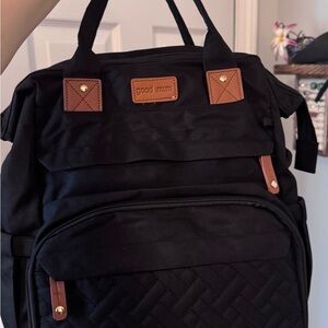 Black Canvas Travel Backpack with Brown Trim